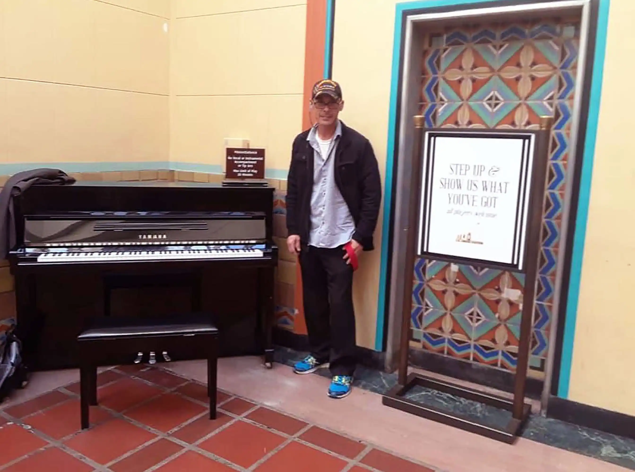 Playing the piano for many at Amtrak Station, Veteran David Haave gives back to the community spirit, CA, USA.